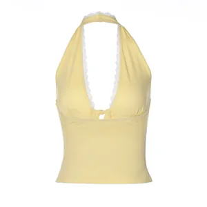 Sexy pale yellow halter neck crop top with delicate lace trim and ribbed fabric texture