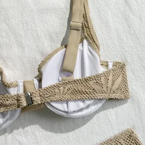 Detail view of beige lace crochet bikini top with adjustable straps and soft padding