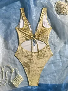 Sexy gold metallic one-piece swimsuit with front tie and stylish waist cut-out details