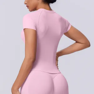 Maglietta da yoga rosa senza cuciture ad alta elasticità e traspirante per donna
