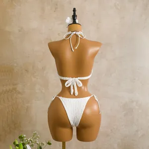 Detailed back view of white textured bikini set on a professional female mannequin