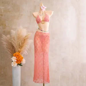Elegant coral pink lace three-piece bikini set with long mesh skirt for women
