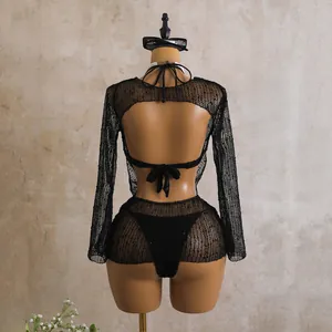 Detailed back view of a black long sleeve sequin mesh three-piece bikini cover-up set