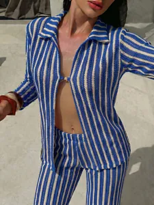 Detailed close-up showing the blue and white striped knit resort wear beach set outfit