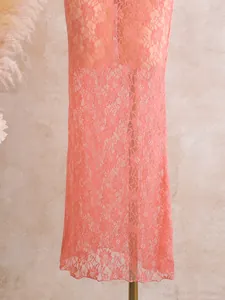 Detailed view of the pink floral lace mesh fabric for a stylish swimsuit cover-up dress