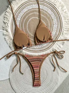 Textured striped bikini set in brown and earthy tones for beach vacations.