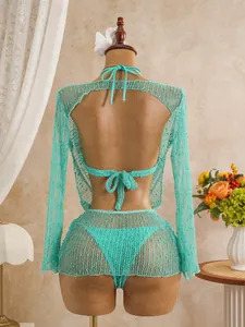 Back view of mint green sequin mesh three-piece bikini set with long sleeves