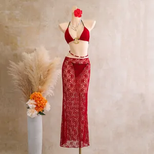 Elegant red lace three-piece bikini set displayed on mannequin with floral accents