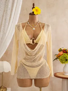 Detail view of 3-piece yellow sequin mesh bikini set with cowl neck cover-up