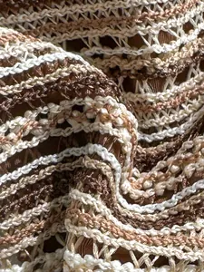 Macro view of detailed striped crochet fabric texture for a beach resort bikini