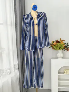 Close-up of blue and white striped textured fabric for beach resort four-piece set