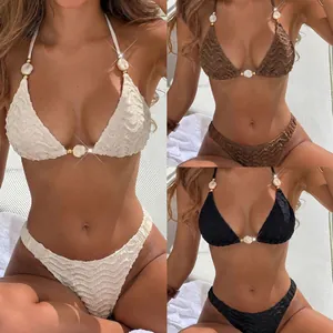 Sexy bikini met textuur en parelschelp accenten in wit, bruin en zwart, set van drie