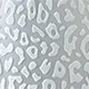 Macro close-up of textured leopard print fabric for sexy silver one-piece swimwear