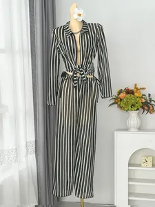 Stylish two-piece striped beach cover-up set with tie-front top and wide-leg pants