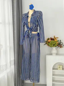 Stylish blue and white striped 4-piece beachwear set including tied shirt and pants