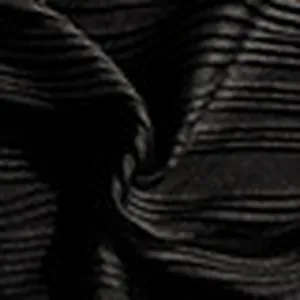 Vista macro detallada de tela negra con textura de ondas para bañador retro de concha