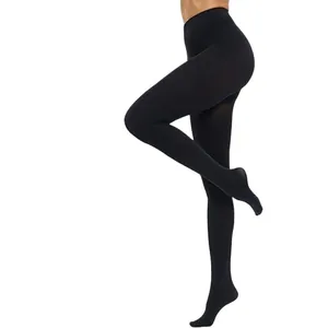 Detail view of 100D black velvet opaque tights showing elastic fit and smooth texture.