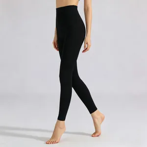Full length side view of high-waisted black fleece-lined leggings for winter warmth