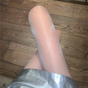 Detailed close-up showing the shimmering glitter effect on pearl luster pantyhose