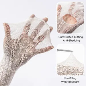 Detail of girls white heart patterned mesh tights showing anti-pilling and durability