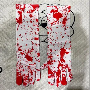Detailed view of long white Halloween arm gloves featuring realistic red blood splatter patterns
