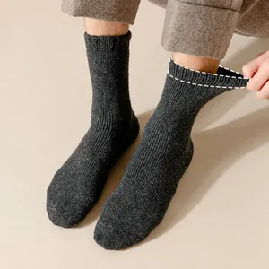 Thick warm antibacterial cotton mid-calf socks with high elastic cuffs shown on feet