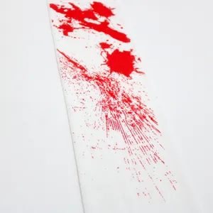 Detailed view of white Halloween socks featuring realistic red blood splatter patterns