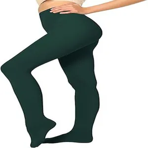 Detailed macro view of opaque dark green 80D velvet pantyhose with a slimming compression fit.