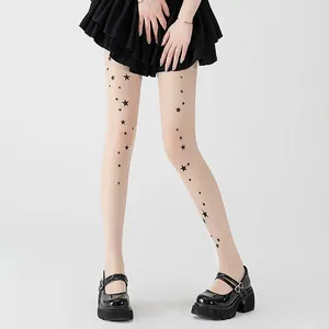 Elegant sheer star print pantyhose featuring black pentagram pattern for women