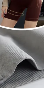 Close-up of high-waisted tummy control shaping shorts with ribbed fabric texture detail