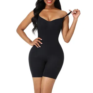 Front view of seamless black tummy control shapewear bodysuit shown on female model
