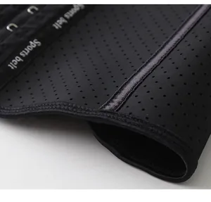 Close-up of breathable perforated fabric and steel bones on black sports waist trainer belt