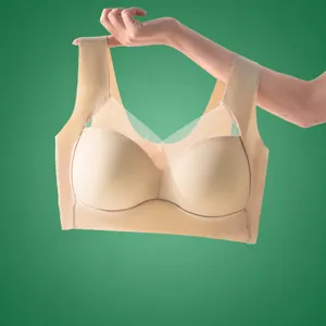 Comfortable beige seamless wireless bra featuring fixed cups and delicate mesh lace details