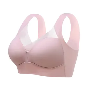 Seamless wireless pink sports bra with v-neck mesh detail for comfort.
