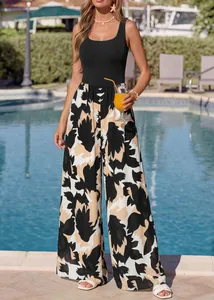 Summer sleeveless wide-leg jumpsuit with floral print shown in a poolside setting.