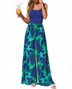 Detailed view of sleeveless square neck jumpsuit with vibrant printed wide leg pants