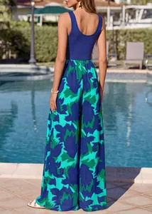 Back view of a sleeveless wide-leg jumpsuit with blue top and green print trousers