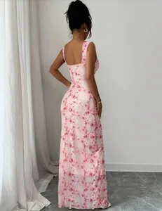 Back view of a slim fit pink floral maxi dress featuring a square backless design