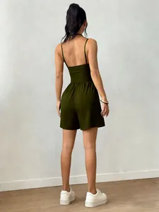 Back view of a chic olive green spaghetti strap wide-leg romper with an elasticated waist