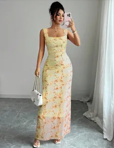 Detailed look of an elegant slim fit floral print maxi dress with square neck for summer