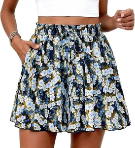 High waist floral A-line skort featuring a drawstring waist and functional pockets