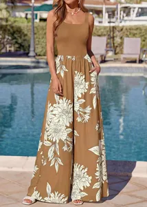 Full view of sleeveless floral print jumpsuit with wide leg pants for summer leisure