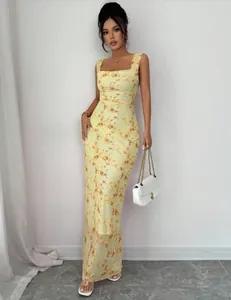 Elegant yellow floral print maxi dress with slim fit and square neckline details for summer