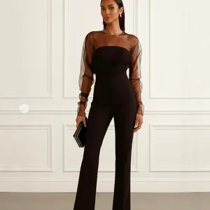 Combinaison noire élégante avec manches en tulle transparent et bustier sans bretelles