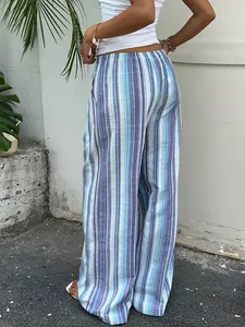 Detailed view of blue and white striped wide-leg pants for a casual summer resort look