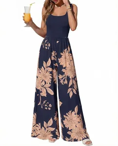 Detail view of model wearing a floral jumpsuit with square neckline and wide-leg silhouette