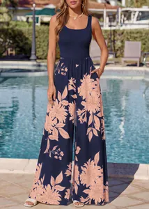 Detail showing the elegant floral print and wide-leg cut of this summer jumpsuit.