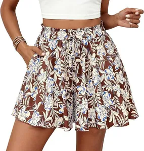 Detailed view of women's floral A-line shorts featuring elastic waist and functional pockets