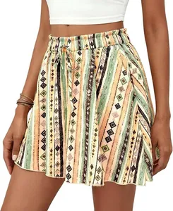Detail view of high-waisted bohemian print shorts with geometric stripe patterns