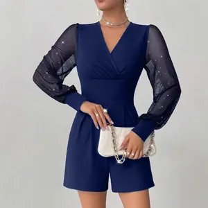 Marineblauer Jumpsuit mit V-Ausschnitt und glitzernden Mesh-Ärmeln für elegante Abendmode
